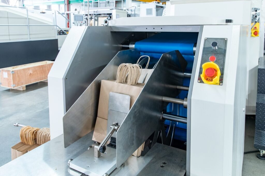 Automatic Roll-fed Twist Rope Paper Bag Machine photo 5