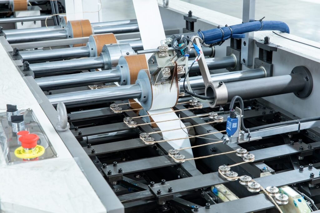 Automatic Roll-fed Twist Rope Paper Bag Machine photo 3